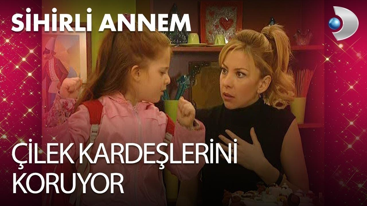 Çilek kardeşlerini koruyor