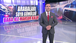 Arabaları suya gömüldü baba-kız mahsur kaldı