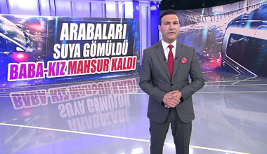 Arabaları suya gömüldü baba-kız mahsur kaldı